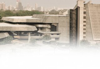 Teresa Carreño Theater in Caracas, Venezuela - Modern brutalist architecture cultural center with distinctive angular concrete design surrounded by urban skyline and green hills